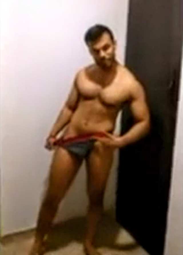 Indian gay video of a sexy hunky model posing and flexing in briefs