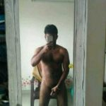 Indian Gay Porn: Sexy desi hunk exposing his big and hard cock on the mirror