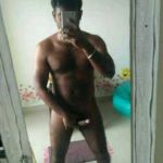 Indian Gay Porn: Sexy desi hunk exposing his big and hard cock on the mirror