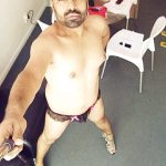 Indian Gay Porn: Sexy NRI hunk exposing his hot body in a skimpy thong and heels