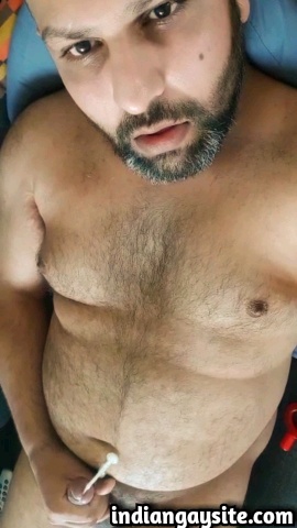 Indian gay video of a sexy desi daddy bear jerking off naked and cumming heavily all over himself