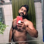 Indian Gay Porn: Horny and sexy desi hairy hunk admiring himself naked in the mirror