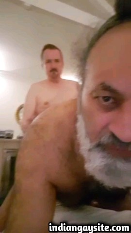 Amateur gay sex video of a horny and mature Punjabi daddy getting fucked bare by his white neighbour