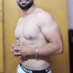 Hot desi hunk exposing his body in bulging briefs