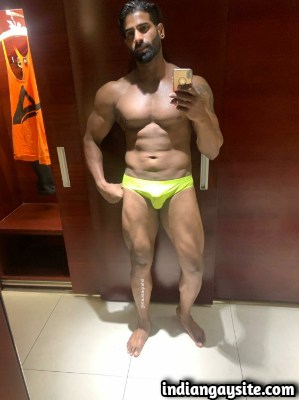 Naked Indian Hunk Shows Muscles in Yellow Speedos