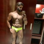 Naked Indian Hunk Shows Muscles in Yellow Speedos