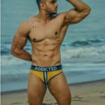 Muscular Indian Hunk in Briefs in the Beach