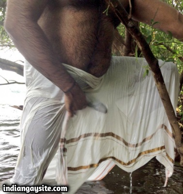 Hairy Indian Bear Bathing in a River in Lungi