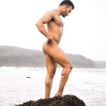 Naked Muscular Hunk Posing & Flexing by the Sea