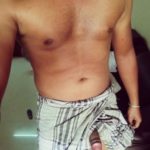 Naked Indian Hunk Shows Dick Peeking Out of Lungi