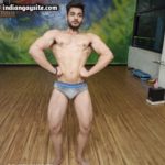 Muscled Naked Man Flexing Smooth Body in Briefs