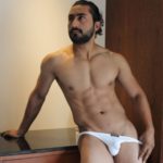 Muscular Nude Hunk in Tiny Briefs Shows Smooth Body