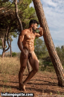 Outdoor gay pics of sexy hunk's nude photoshoot