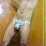 Horny naked hunk posing in sexy briefs