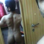 Horny naked hunk shows sexy fit body in mirror