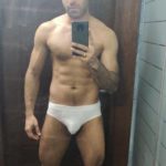 Muscular Indian hunk shows fit body in white briefs