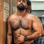 Hairy muscle hunk shows sexy body in bulging briefs