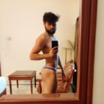 Horny muscular hunk teasing sexy body in undies