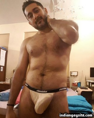 Naked fit hunk trying out different sexy briefs