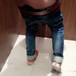 Horny Indian boy shows off hot ass in public toilet