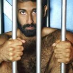 Naked hairy bear in bondage gay photoshoot