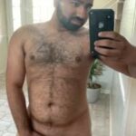 Stripping gay bear teasing hot body and cock