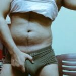 Bulging horny man teasing in sexy hot undies