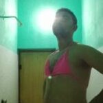 Naked crossdresser man shows body in bra and panties