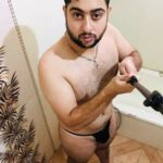 Slutty gay guy teasing his lovely ass and nude body