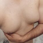 Man boobs pics of a horny gay bottom boy