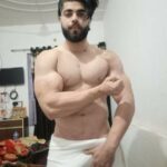 Muscular horny hunk teasing his sexy nude body in pics