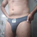 Big dick hunk teasing his hot boner in stripping pics