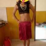 Crossdressing Indian man teasing in a saree in pics