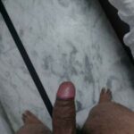 Horny Delhi man teasing his big uncut boner in pics