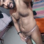 Hairy nude man shows off sexy body and uncut cock