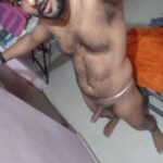 Hairy nude man shows off sexy body and uncut cock