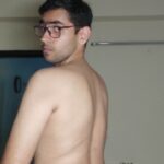 Tall naked boy teasing butt and dick in nude gay pics