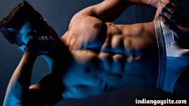 Gay underwear model flexing muscles in hot nudes