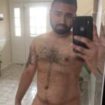 Hairy chubby man teasing his sexy body in pics