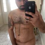 Hairy chubby man teasing his sexy body in pics