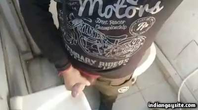 Public masturbating boy teasing his big dick in toilet